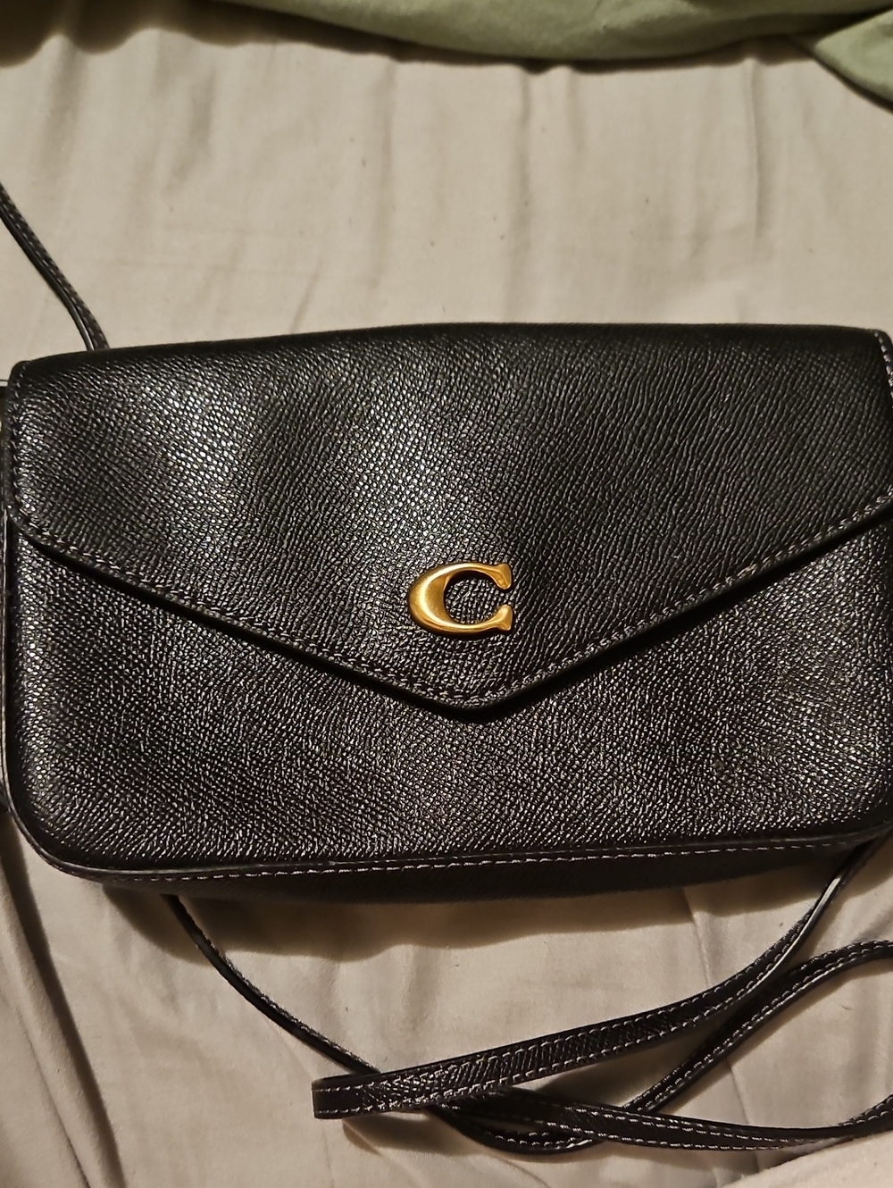 Black Leather Crossbody Bag with Gold 'C' Accent